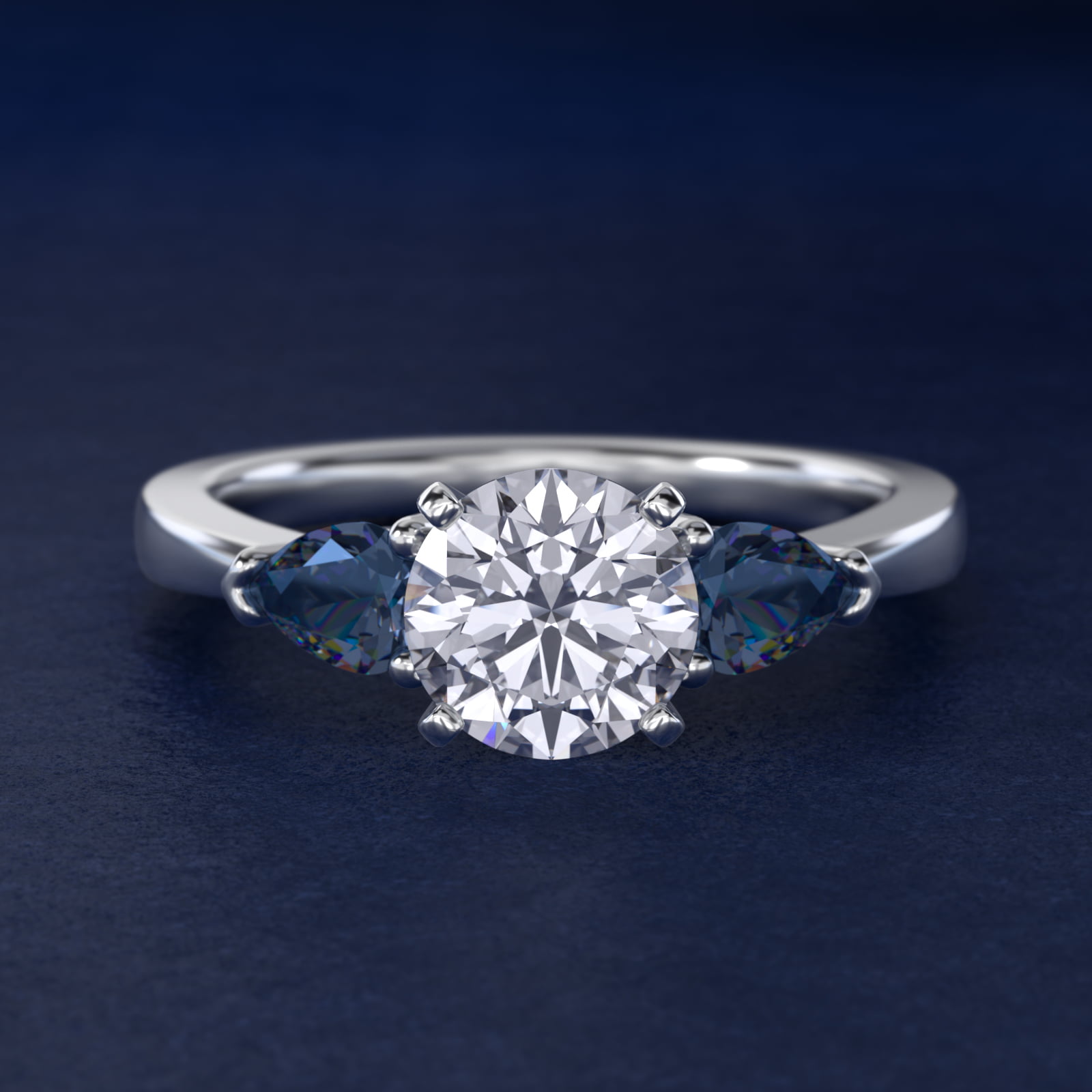 Classic Pear Shaped Sapphire Engagement Ring in 18k White Gold
