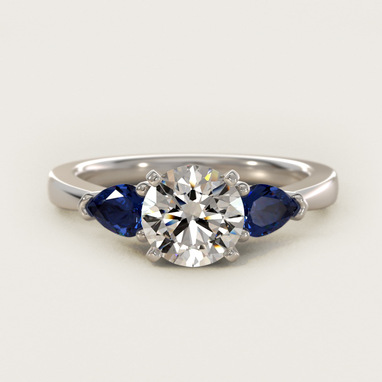 Classic Pear Shaped Sapphire Engagement Ring in 18k White Gold — Round center