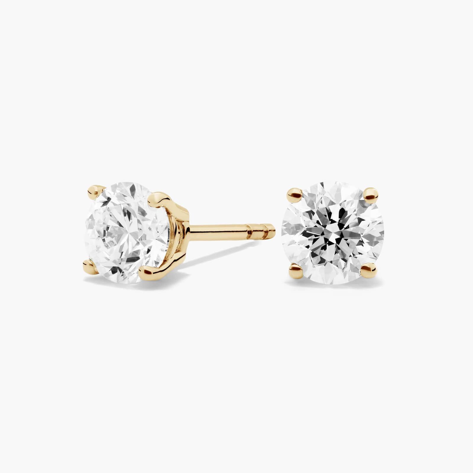 Four Prong Round Brilliant Diamond Stud Earrings In 14K Yellow Gold (1 Ct. tw. - H-I / SI1-SI2)
