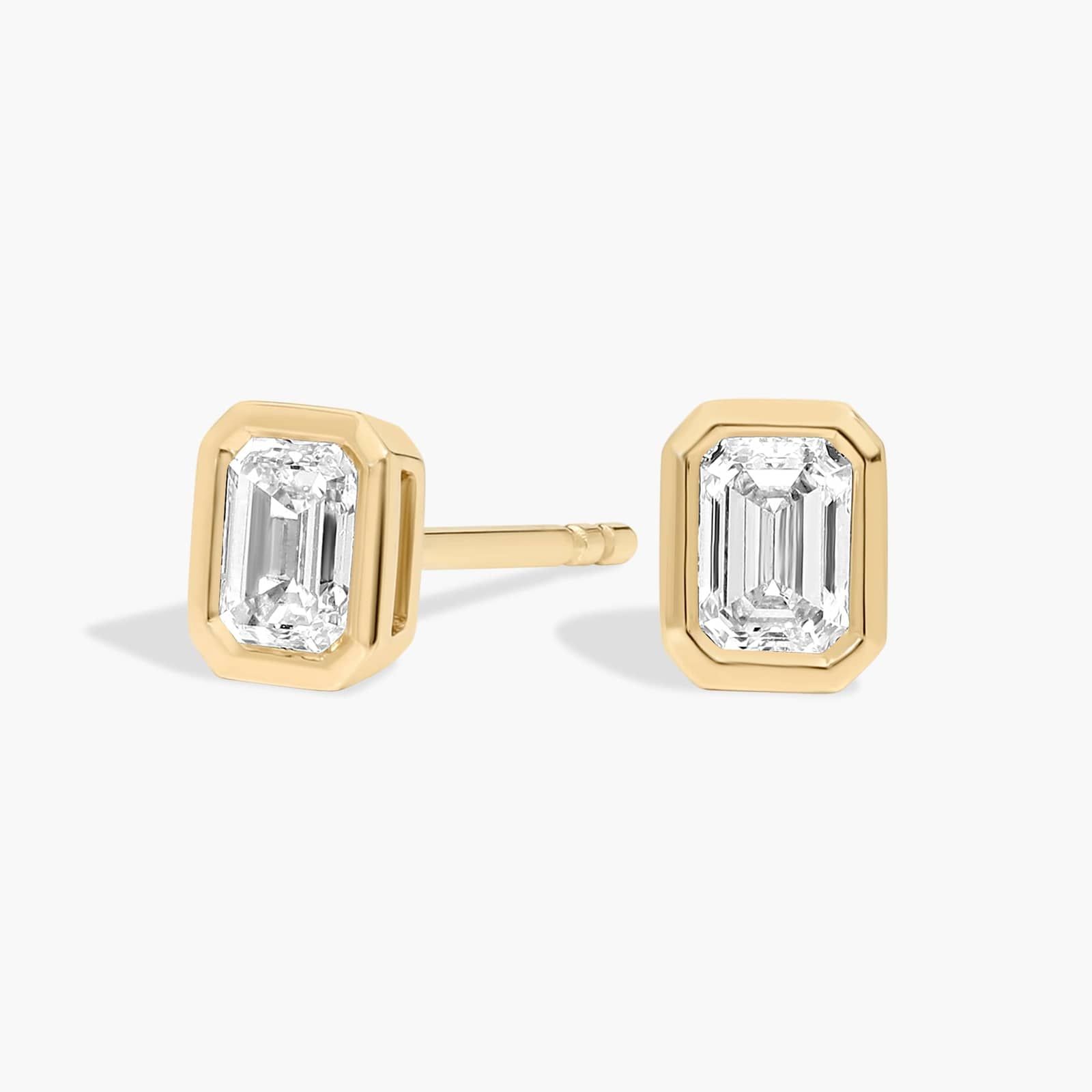 Bezel Set Emerald Cut Diamond Stud Earrings In 14K Yellow Gold (1/2 Ct. tw. - H-I / SI1-SI2)