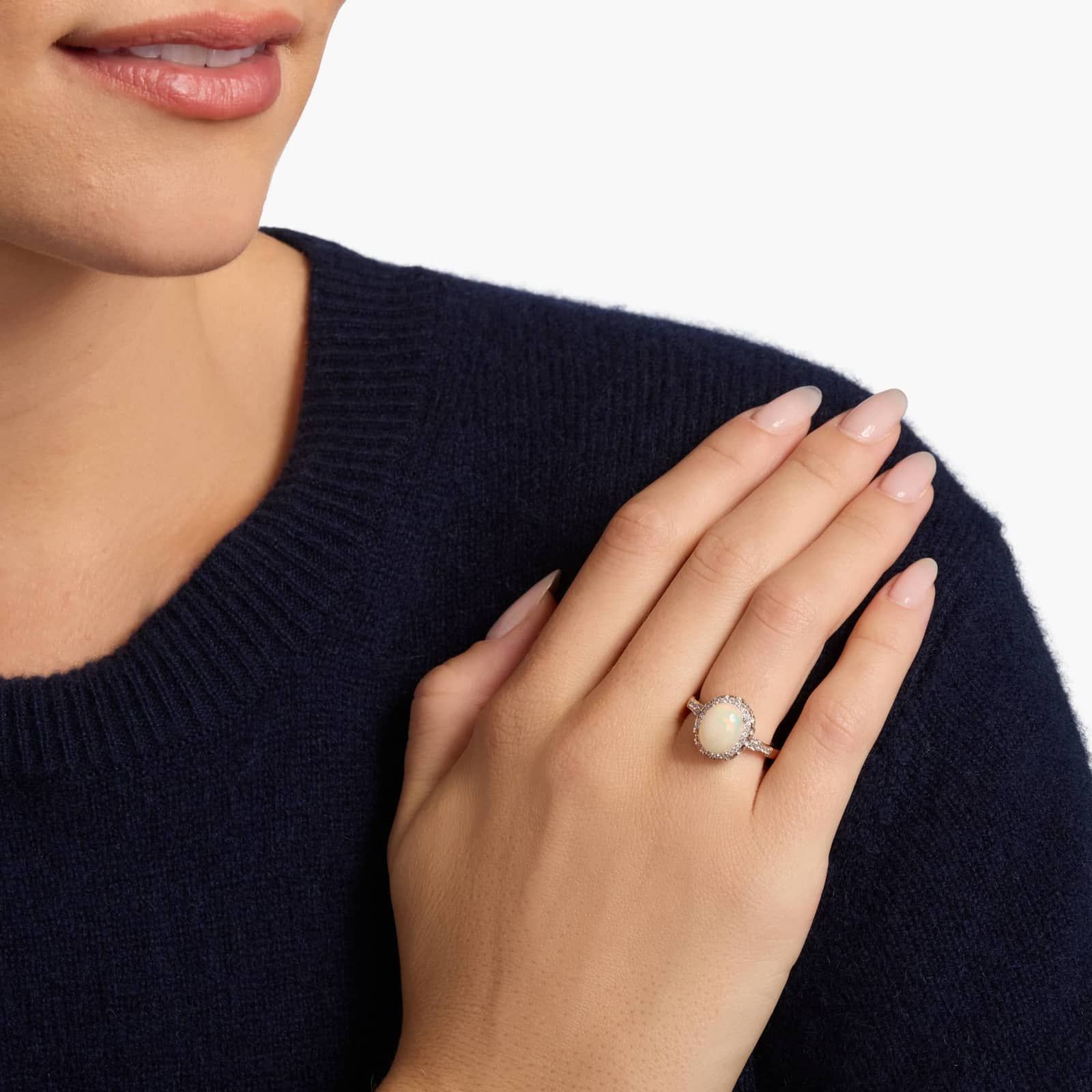 Oval Opal and Swiss Blue Topaz Halo Ring in 14k Rose Gold 3