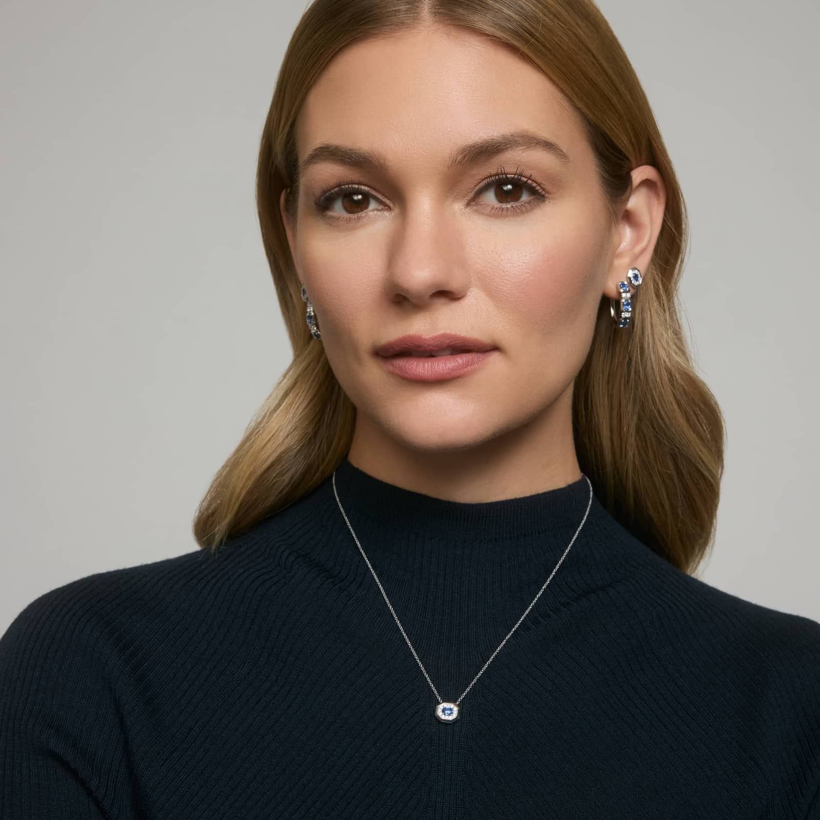 Oval Cut Blue Sapphire and Pavé Diamond Stud Earrings In 14K White Gold 4