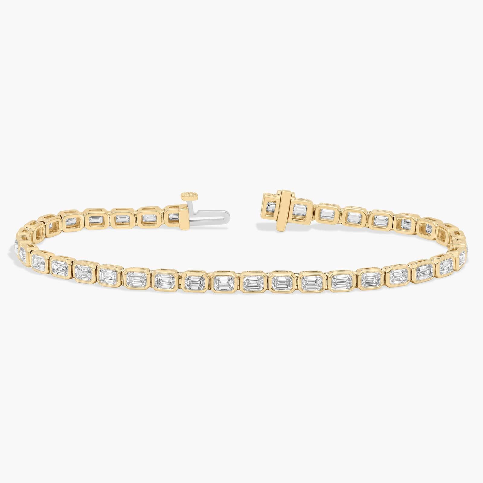 7 " Emerald Cut Lab Grown Diamond E/W Bezel Set Tennis Bracelet In 14K Yellow Gold (5 Ct. tw. - F-G / VS2-SI1) 2