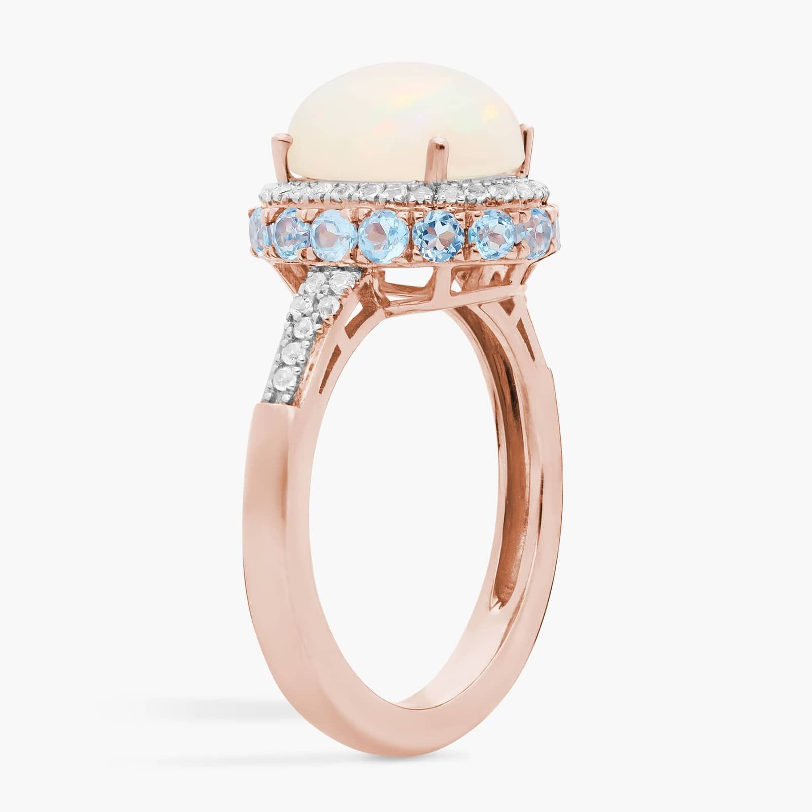 Oval Opal and Swiss Blue Topaz Halo Ring in 14k Rose Gold 2